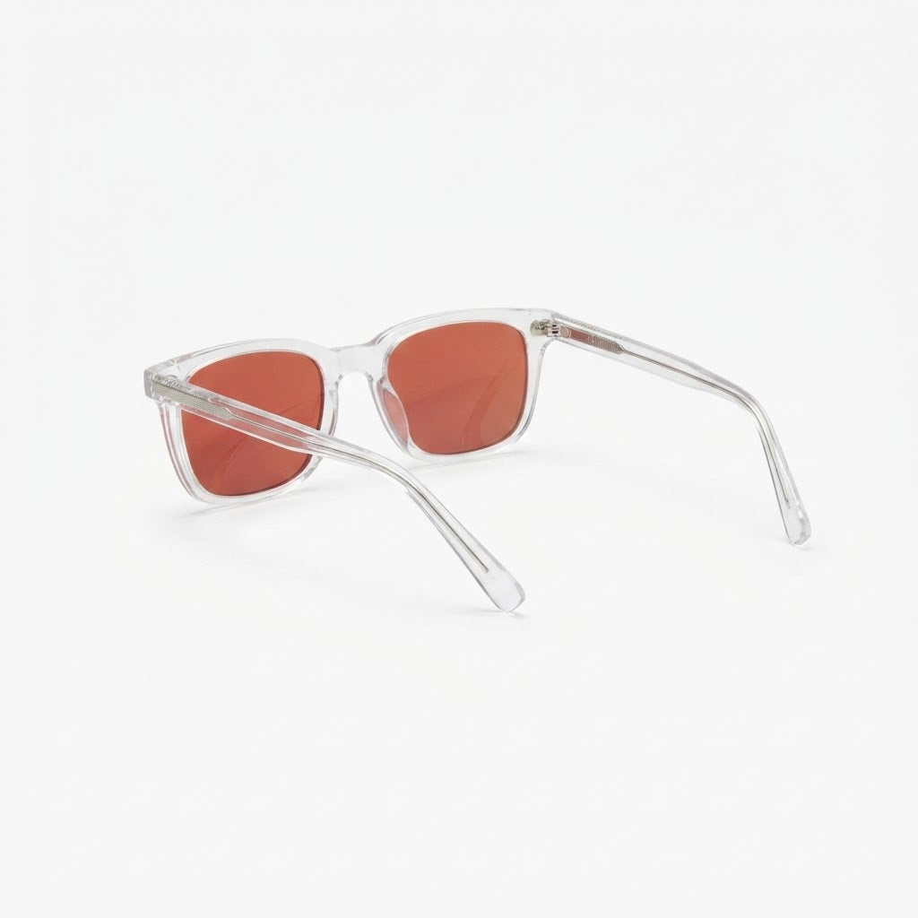 Back three-quarter view of Locked Eyewear Deload red-lens blue light glasses, clear frame and red tint for evening and night screen use