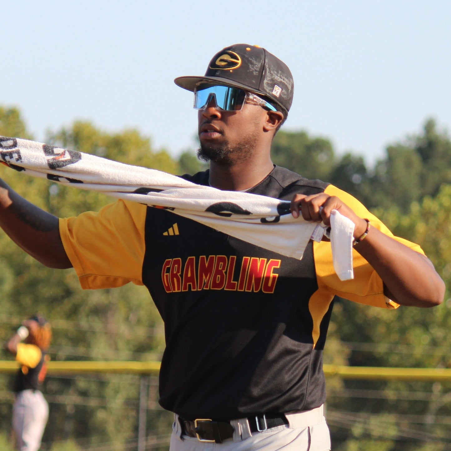 Baseball player wearing Locked Eyewear on the baseball field.