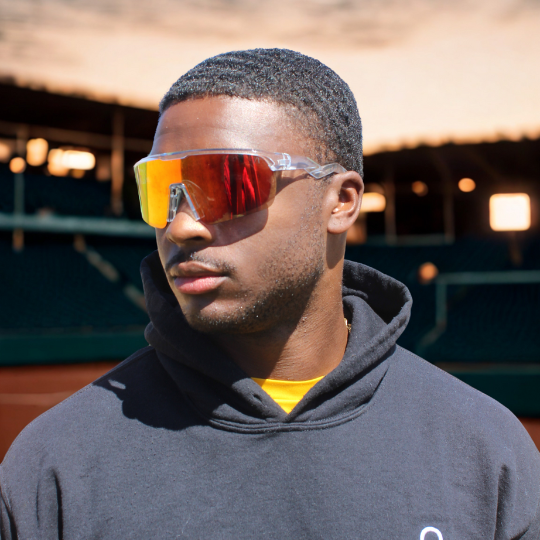 High-performance sport sunglasses with red lens shown from left angle – bold design and Oakley-quality durability by Locked Eyewear.
