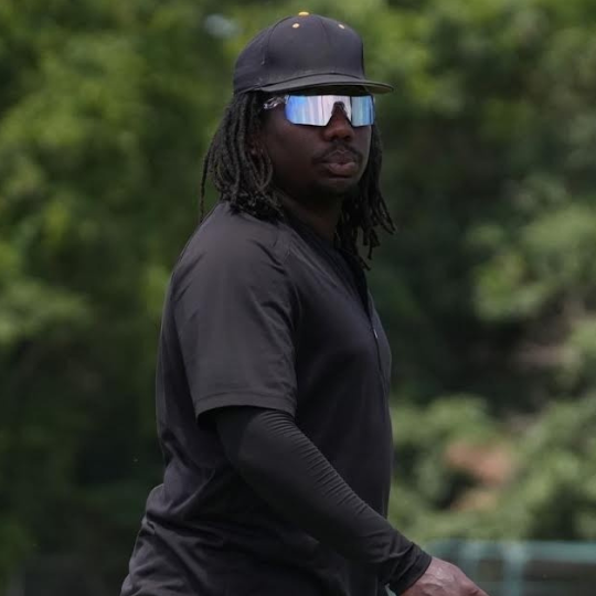 Close-up of baseball player wearing PA10 sport sunglasses with reflective polarized lenses, built for pro-level sun glare reduction.
