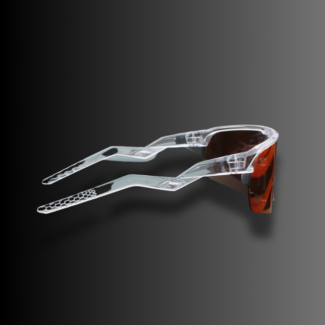 Side profile of Locked Eyewear Revelation red lens baseball sunglasses – transparent zigzag arms with no-slip grip and aerodynamic sport design.