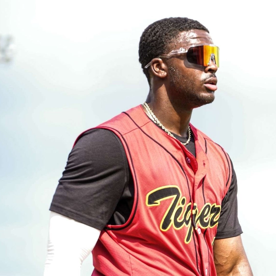 Image of black baseball player Lamar Bennett wearing Locked eyewear high performing baseball sport sunglasses.