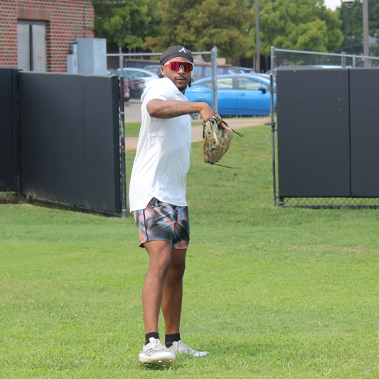 Professional baseball player eating high-protein meal with healthy nutrition tips to improve performance and recovery on the field.
