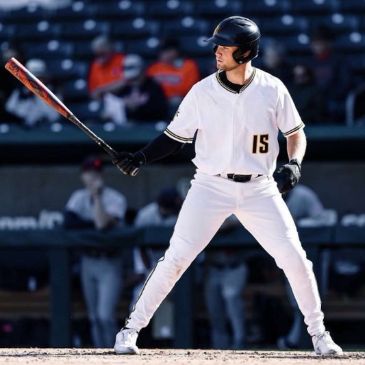 Image of Baseball Player Ryan Callahan Playing first base for Wichita State wearing Locked Eyewear.