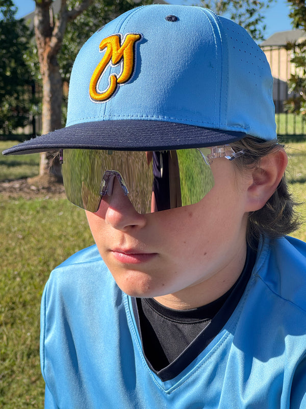 Baseball defender wearing polarized sunglasses during infield drills