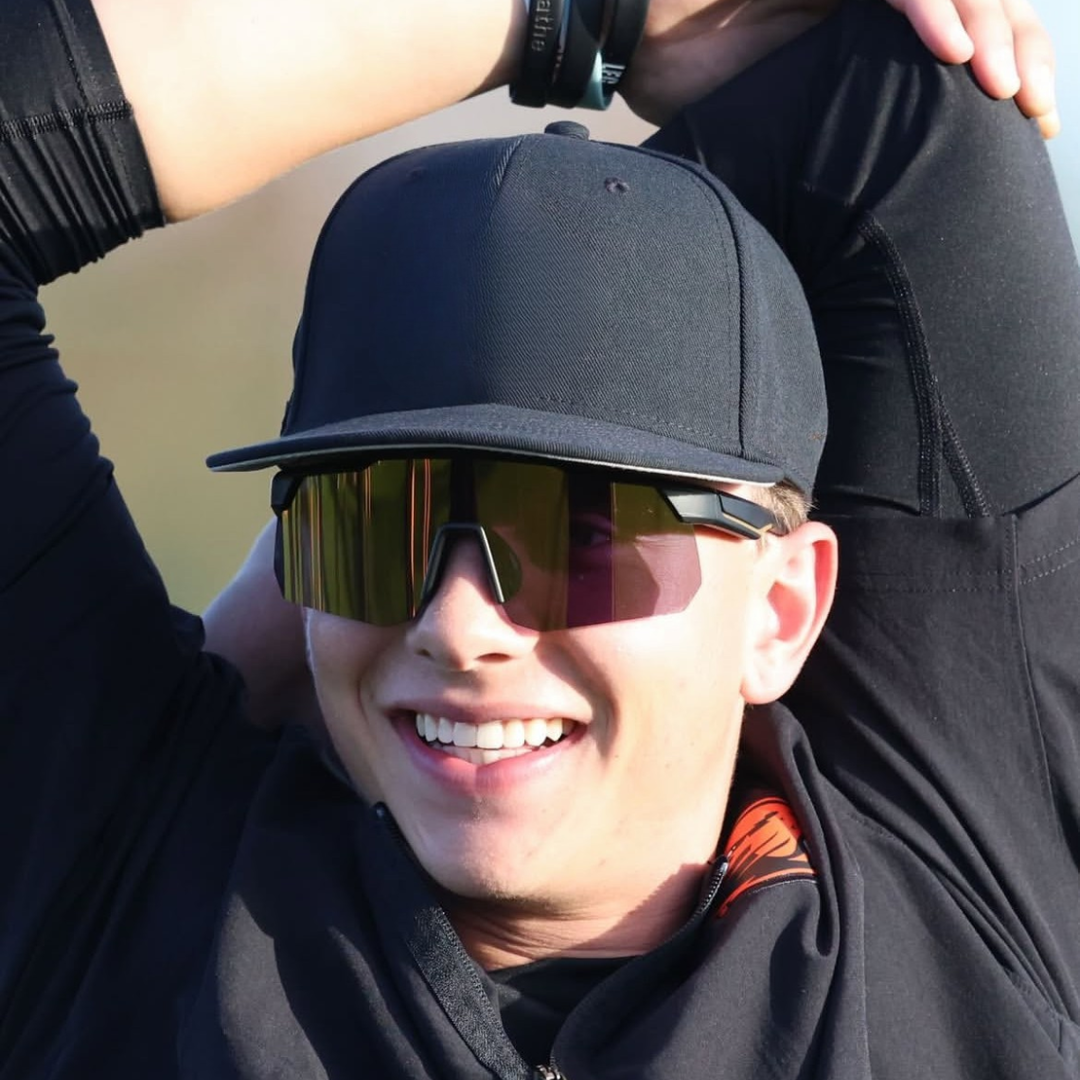 Locked Eyewear Defender baseball sunglasses for outfielder with reflective lens designed for pro-grade clarity worn by Oregon State University baseball player Easton Taft during game competition