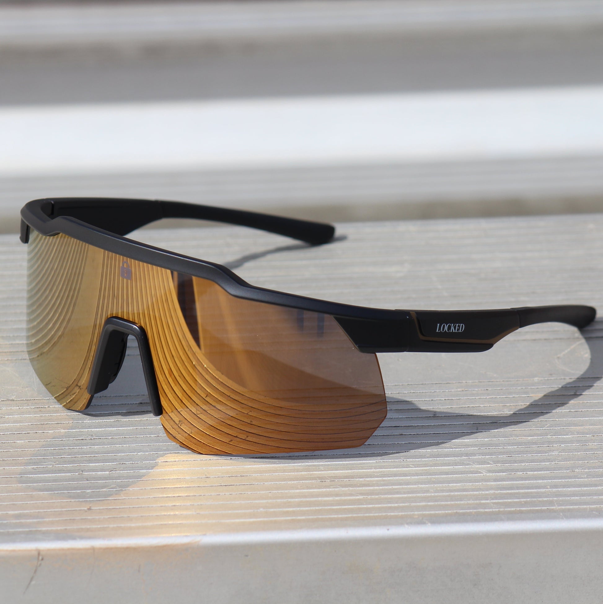 Left-angled view of Locked Eyewear Defender sunglasses, highlighting the scratch-resistant lenses and stylish design."