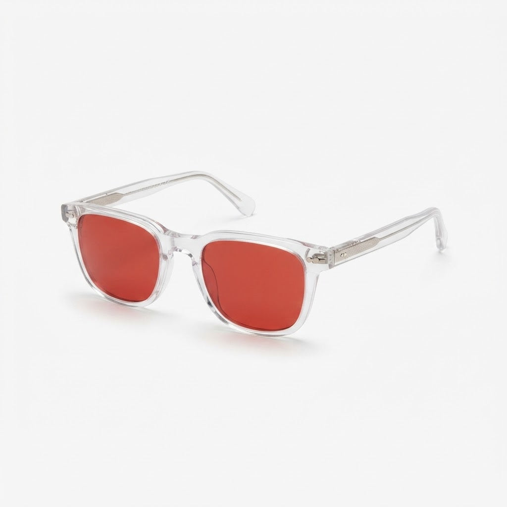 Angled view of Locked Eyewear Deload red-lens blue light glasses, clear frame and amber-red lens for screens after the last out