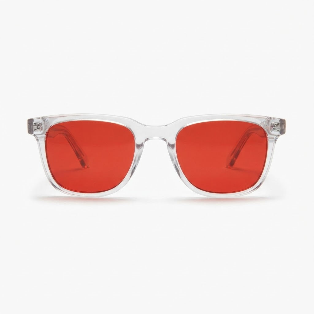 Locked Eyewear Deload blue light glasses, front view — clear translucent frame with red lens that blocks ~98.5% of blue light for night screen time