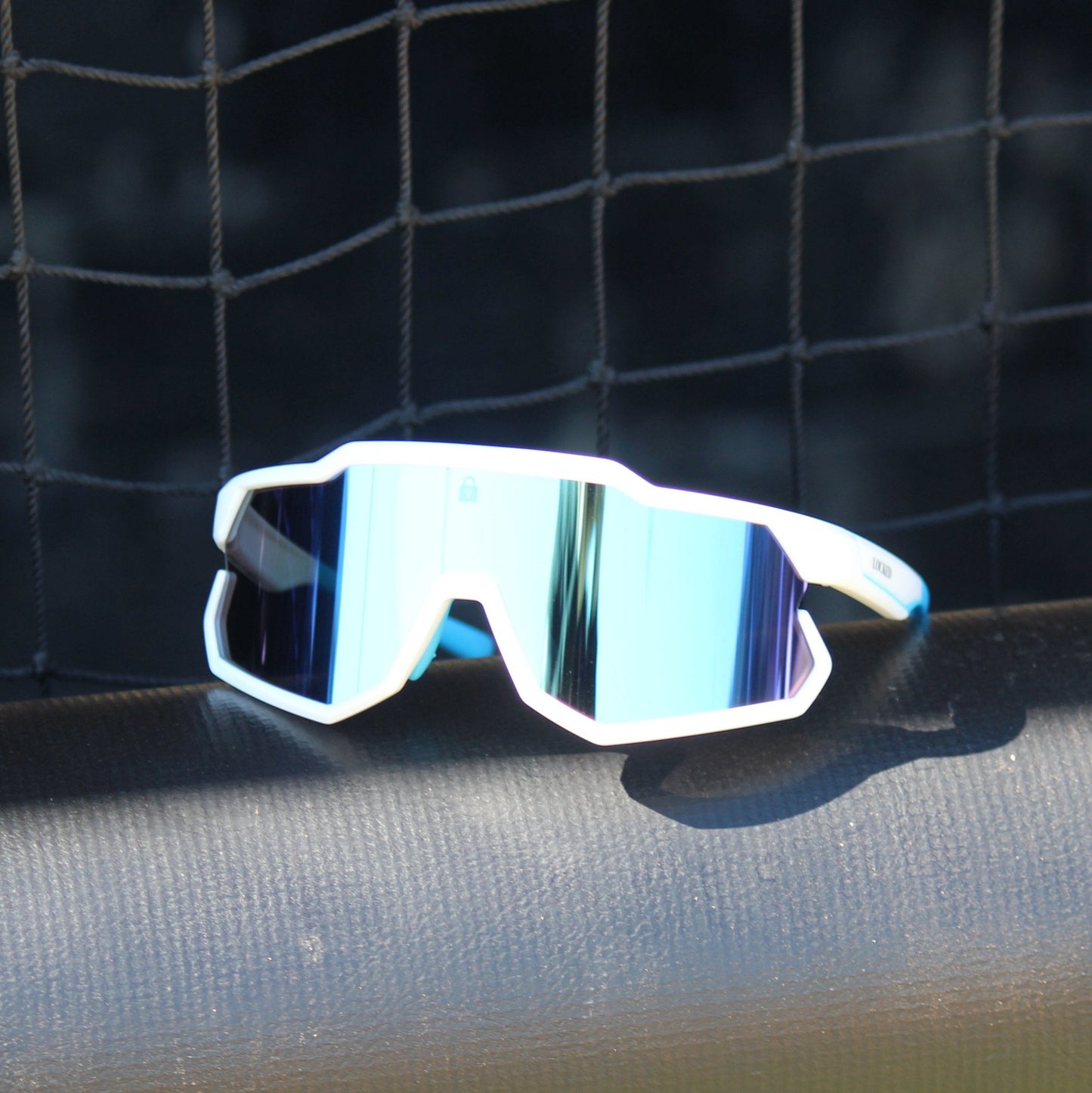 Left-angled view of Locked Eyewear FirstPitch sunglasses, highlighting anti-reflective lenses and a sleek design.