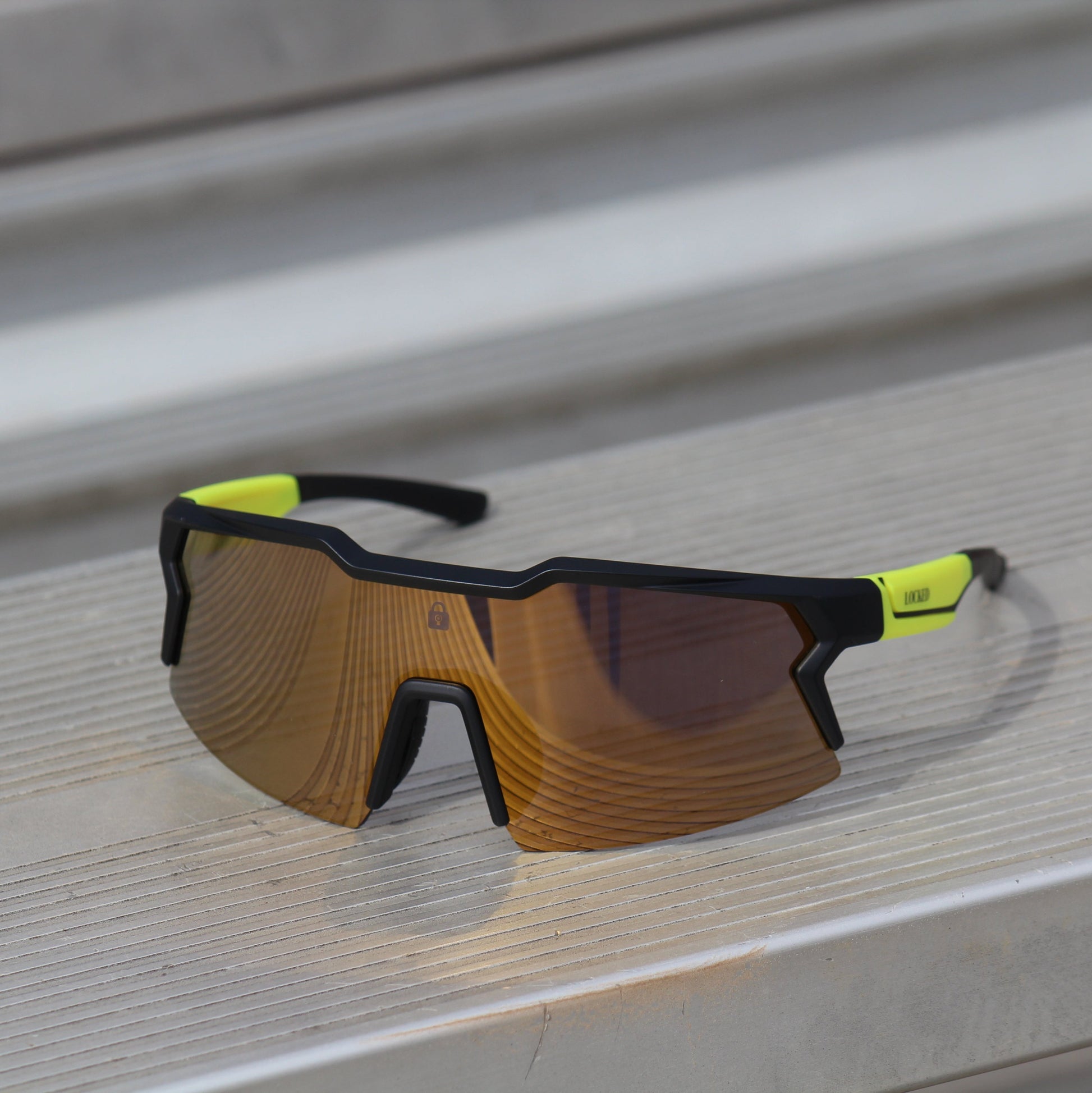 Top-down view of Locked Eyewear Firefly sunglasses, showcasing the ergonomic fit and durable materials for active lifestyles.