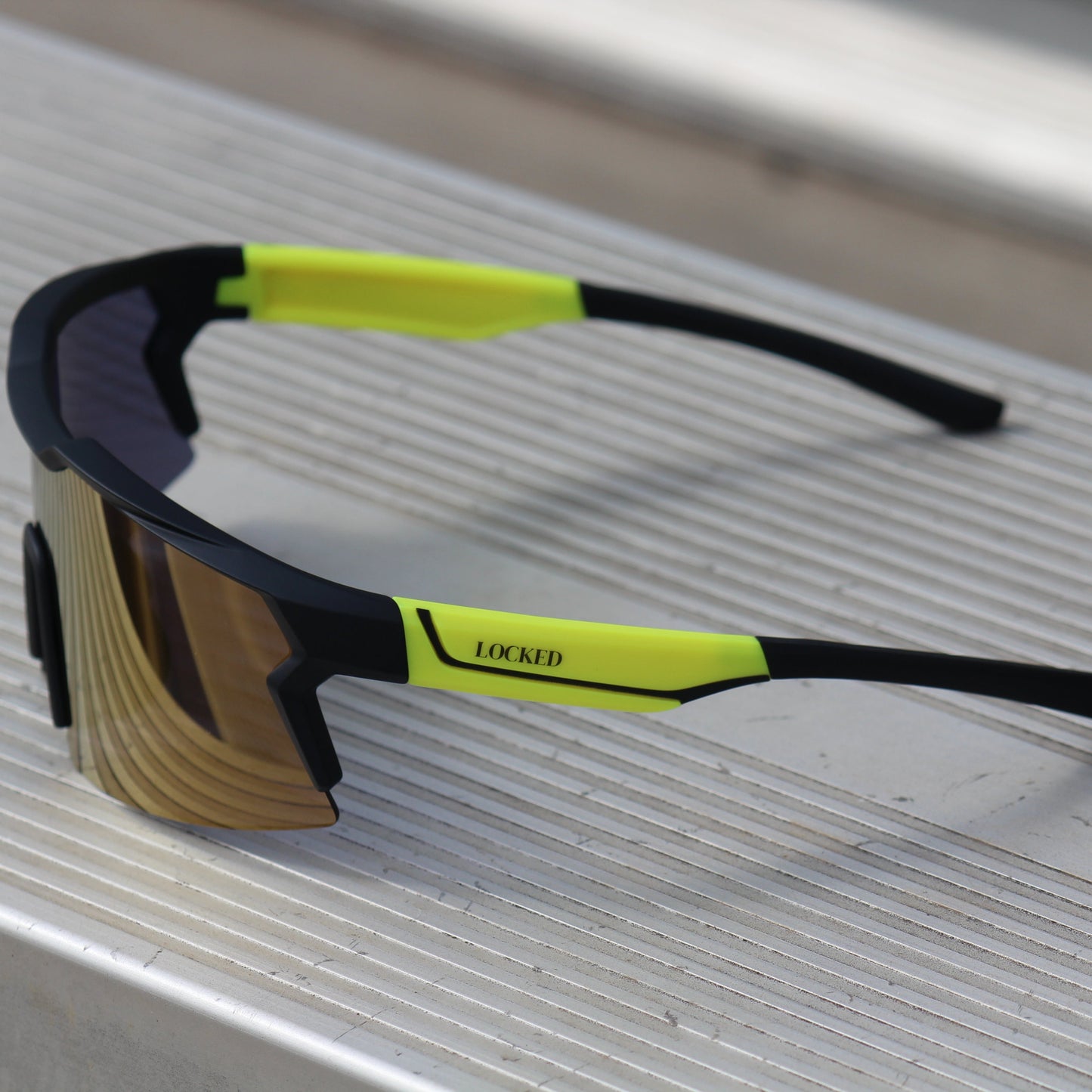 Left Side view of Locked Eyewear Firefly sunglasses, showcasing the ergonomic fit and durable materials for active lifestyles.