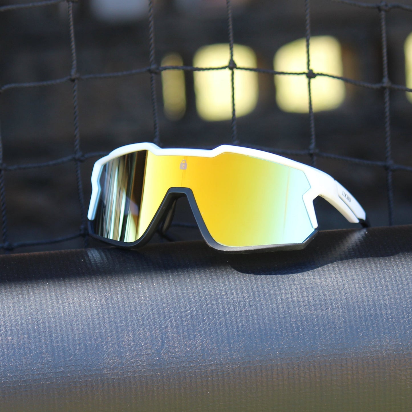 Locked Eyewear Lockdown sunglasses with scratch-resistant, polarized lenses for ultimate clarity and protection during sports.