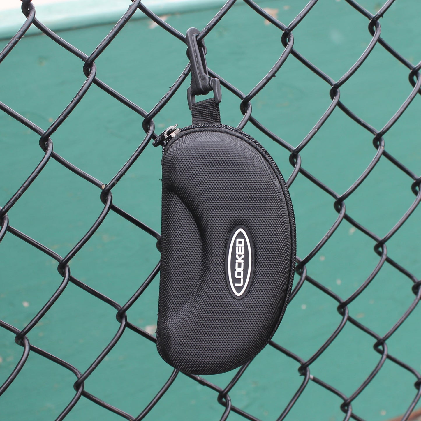 Locked EVA foam protective sport sunglasses case with durable zipper, compact design, and shock-resistant shell — ideal for baseball, football, and outdoor athletes needing secure eyewear protection.