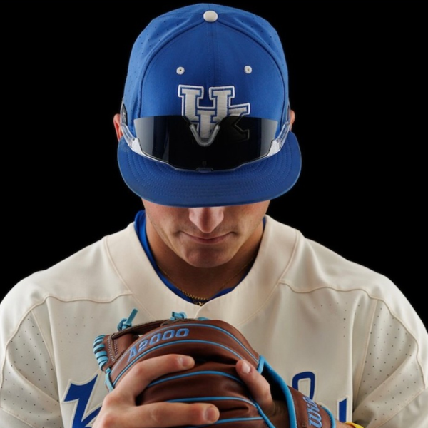Infielder making a play wearing pro-grade baseball sunglasses in sunlight