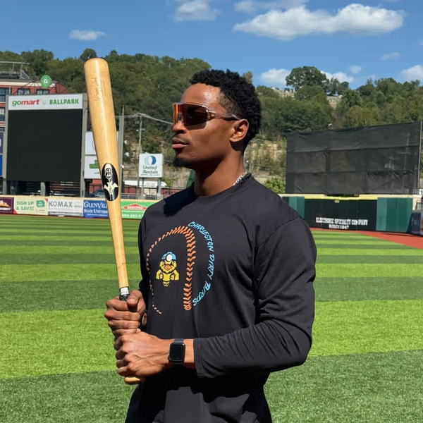 Baseball athlete wearing Locked Eyewear sunglasses during batting practice.