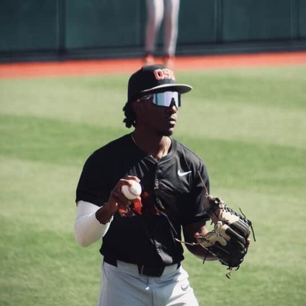 Baseball coach wearing Locked Eyewear sunglasses designed for long days on the field