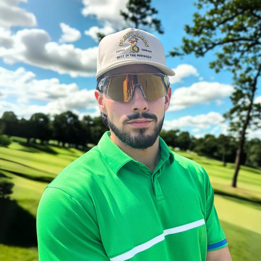 Professional golfer wearing the Revelation baseball sunglasses from Locked eyewear. Elite Athlete’s elevate their game and style with Locked sport sunglasses.