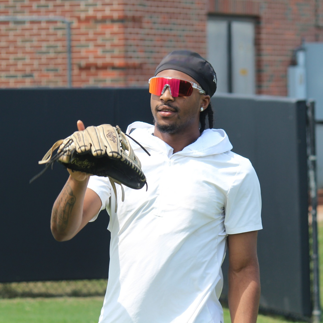 Baseball player wearing Locked Eyewear Revelation Red polarized sport sunglasses — pro grade baseball sunglasses built for elite vision, comfort, and performance on the field.
